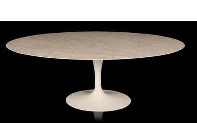 EERO SAARINEN FOR KNOLL: A TULIP DINING TABLE with oval bia...