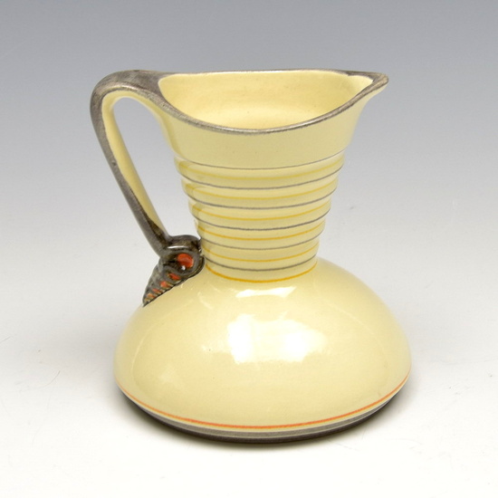 Earthenware pitcher with coloured decoration, executed by Kennemer...