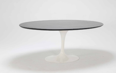 Eero Saarinen (1910-1961) for Knoll International: Large oval 'Tulip' dining table, black granite
