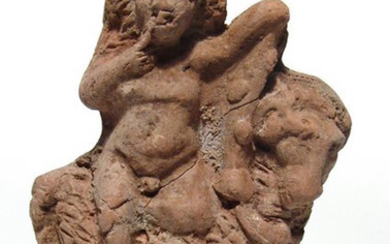 Egyptian terracotta figure of Harpokrates seated on ram