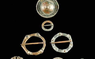 Eight 7th C. European Silver, Bronze, & Brass Brooches