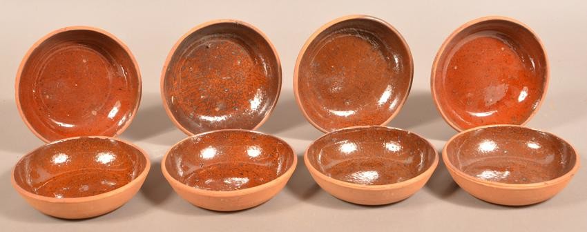 Eight Glazed Redware Pottery Bowls.