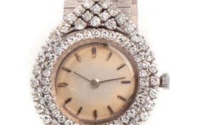 Élégante montre bracelet de dame en or gris... - Lot 53 - Drouot Estimations