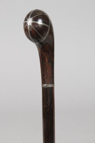 Epoque Art Deco macassar and silver filet inlay with a mallet handle. D : 90 cm. Bibliography : (C. D. "Objets d'art",p.379).