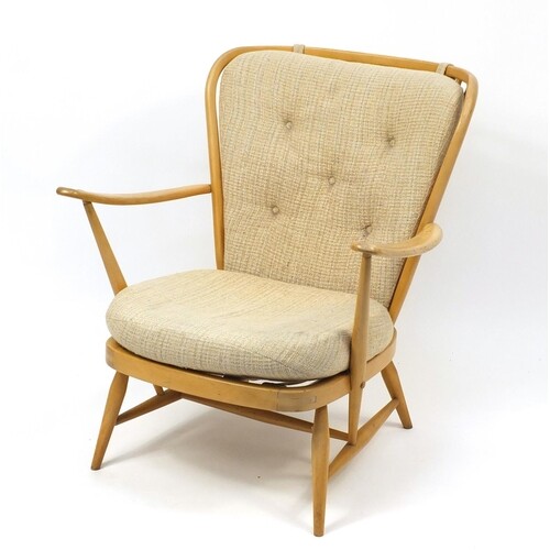 Ercol light elm Windsor stick back arm chair, 83cm high