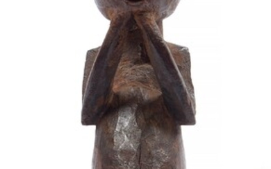 "Fétiche anthropomorphe" hungana en bois sculpté et enduit. Travail de la République Démocratique du Congo....