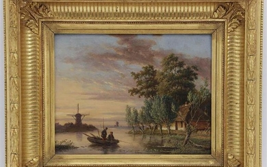 Fishermen in a boat and farm at a windmill in sunset