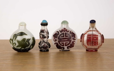 Four Peking glass snuff bottles Chinese including an opaque bottle...