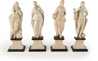 Four ivory statuettes representing the seasons