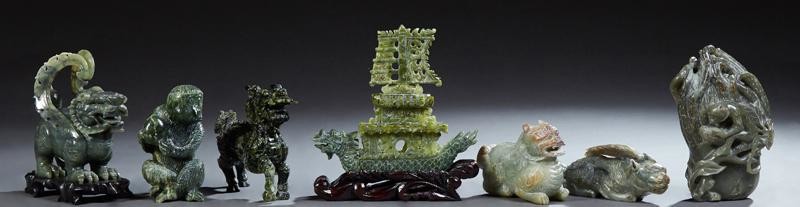 Group of Seven Chinese Spinach Jade Carvings, 20th c.