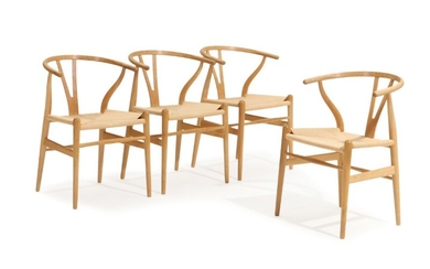 Hans J. Wegner: “Y-chair/The Wishbone Chair”. Four oak armchairs, seats with woven papercord. Manufactured by Carl Hansen & Son. (4)