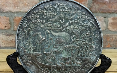 Japanese bronze mirror back with ornate crane and floral det...