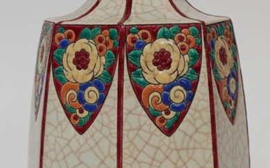 LONGWY. Earthenware paneled vase with enamelled decoration of flowers in escutcheons. 27 cm