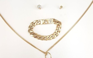 LOT in gold 750 ‰ including a two-heart pendant with its suspension chain (pds 5.3 g), a flexible ring monogrammed "FB" (pds 4.8 g), an earring (pds 0.3 g) and an earring with a diamond (PB 11.2 g)