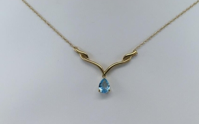 Ladies Blue Topaz Yellow Gold Necklace