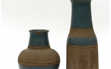 Lotto composto da due vasi in terracotta smaltata nei toni dell'azzurro opaco e graffita. Italia, anni '50. (cm h 30;...