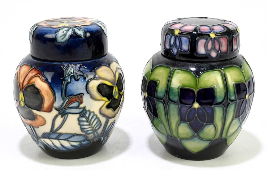 MOORCROFT; two ginger jars and covers, including an example decorated...