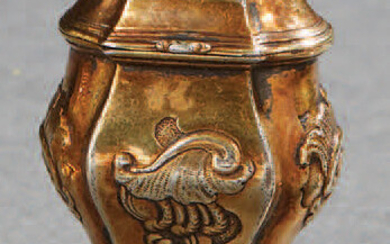 Ointment jar in repoussé vermilion with scroll decorations....