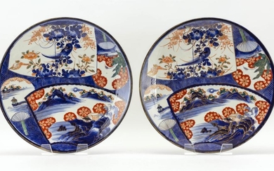 PAIR OF JAPANESE IMARI CHARGERS With floral and landscape fan-shaped cartouches and gilt highlights. Diameters 16".