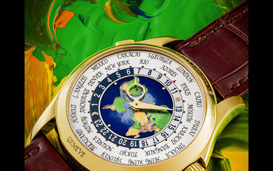 PATEK PHILIPPE. A RARE AND BEAUTIFUL 18K GOLD AUTOMATIC WORLD TIME WRISTWATCH WITH CLOISONNÉ ENAMEL DIAL REF. 5131J, CIRCA 2010