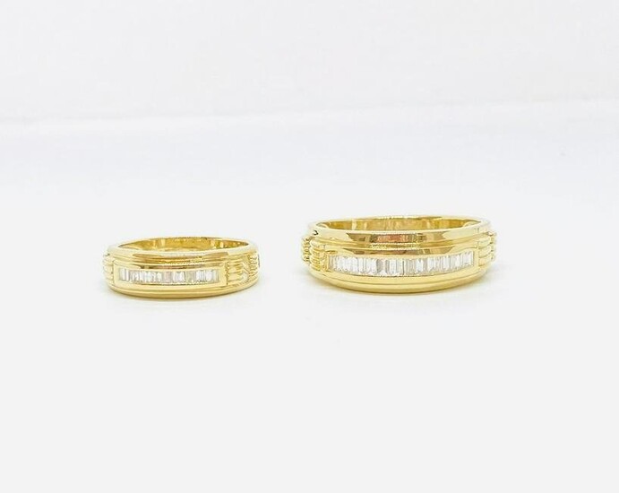 Pair 14k yellow gold baguette diamond wedding bands
