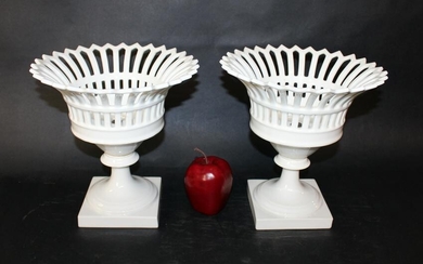 Pair of Paris porcelain reticulated basket urns