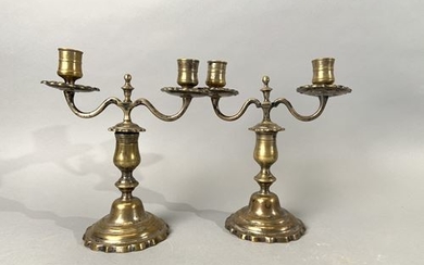 Pair of bronze torches formerly silvered with two...