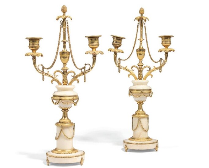 Pair of gilt bronze torches with two light arms made...