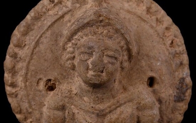 Parthian Terracotta Medallion with Female Bust
