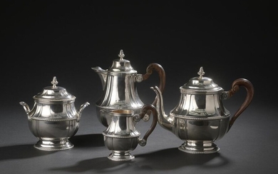 A silver tea and coffee service in the form of...