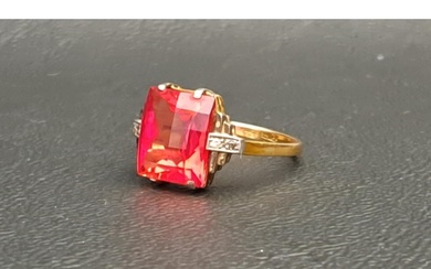 RED GEM AND DIAMOND SET RING the central checkerboard cut ge...