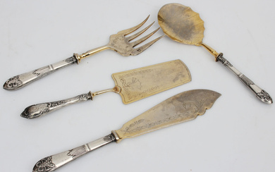 Silver cutlery set - salad spoon, roasting fork, knife, cake spatula Silver, proof 875 (handle), metal. Serving fork - 24 cm, knife - 26 cm, cake spatula - 24.5 cm, salad spoon - 22.5 cm