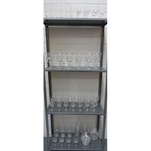 Suite of drinking glasses with etched monogram and facet cut...