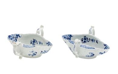 TWO SIMILAR EARLY WORCESTER PORCELAIN TWO-HANDLED SAUCE BOATS Second half 18th century