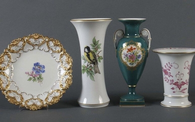 Three vases and a decorative plate Meissen, 1958, 1962, 1977, 1980 (each with the year sign), porcelain with varying onglaze painting, the trumpet-shaped vase with Indian painting in purple with gold dots and gold rim, pole vase with light bird and...