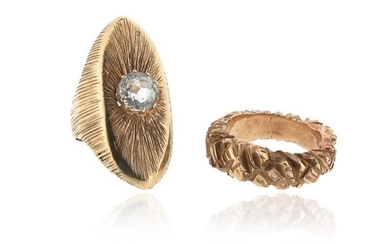 Two gold rings, one navette-shaped gold ring with...