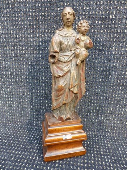 "Virgin and child" in carved and polychromed wood....