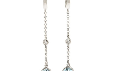 A pair of aquamarine and diamond ear pendants each set with an oval-cut aquamarine and a brilliant-cut diamond, mounted in 18k white gold. L. 4.6 cm. (2)