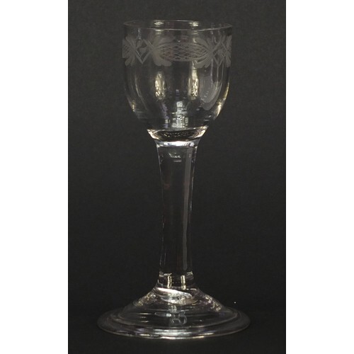 18th century wine glass with engraved bowl and folded foot, ...