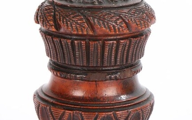 19th Century lignum vitae 'Go to Bed', the circular leaf carved top with candle holder unscrewing to