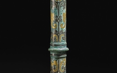 A GOLD AND SILVER-INLAID BRONZE CHARIOT FITTING HAN DYNASTY