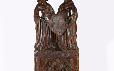 3283454. A RARE AND GOOD EARLY 15TH CENTURY OAK FIGURAL PEW END, ENGLISH, CIRCA 1400.