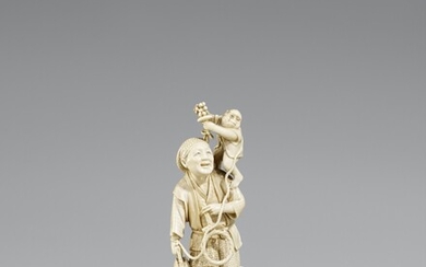 An ivory okimono of a monkey trainer. Early 20th century
