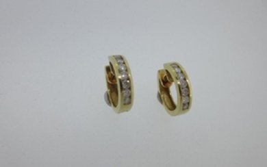 A pair of 18ct gold and channel set diamond earhoops