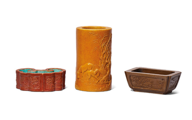 A CARVED AMBER-GLAZED ‘HORSES’ BRUSHPOT AND TWO MOULDED AND GLAZED BRUSH WASHERS, QING DYNASTY, 19TH CENTURY, WANG BINGRONG MARKS