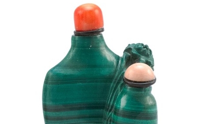 CHINESE MALACHITE DOUBLE SNUFF BOTTLE Conjoined spade-shape and ovoid bottles, carved at shoulder with a high-relief floral design....