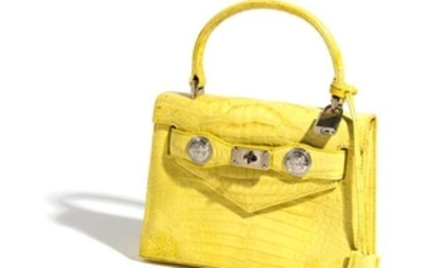 A Gianni Versace Yellow Crocodile Handbag
