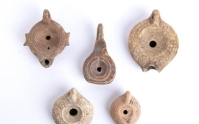 Group of five terracotta lamps 1st - 3rd century AD;...