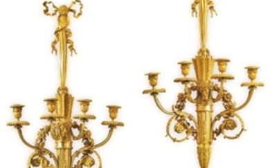 Henry Dasson (1825 - 1896) A pair of French gilt-bronze four-light wall-lights after a model of Pierre Gouthière, dated 1882
