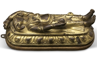 A LARGE GILT-BRONZE 'LOTUS' BASE WITH GANAPATI, TIBETO-CHINESE, 18TH CENTURY